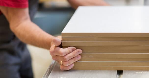 Carpenter with MDF boards